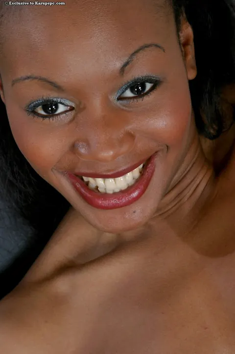 Ebony Woman in a Skirt Spreads Her Shaved Pussy – photo 16 of 16