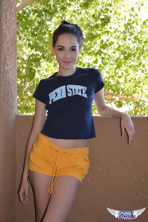 Emily Grey: Skinny Brunette Strips Out of Her Shorts on a Balcony – photo 5 of 12