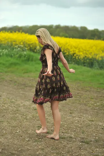 Busty Blonde in High Heels Spreads Her Legs Outdoors