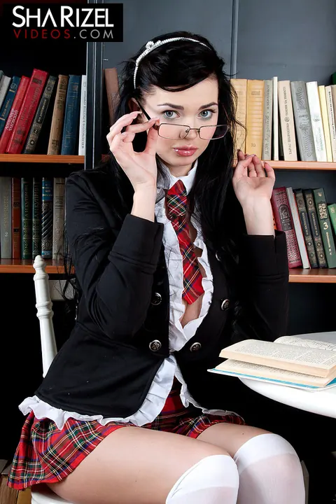 Sha Rizel: Slim Brunette in Uniform and Heels Spreads at the Library – photo 3 of 16