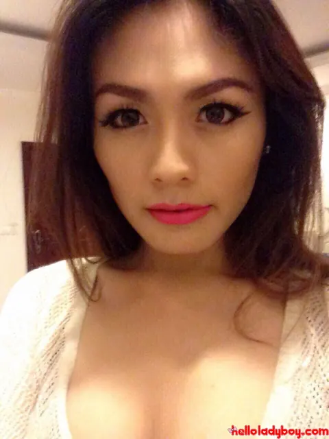 Asian Trans Woman Peels Off Her Top and Poses Nude in Profile – photo 3 of 11