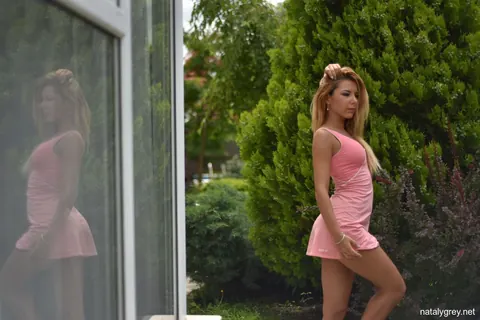 Blonde Lifts Her Hem and Spreads Her Legs Outdoors – photo 4 of 17