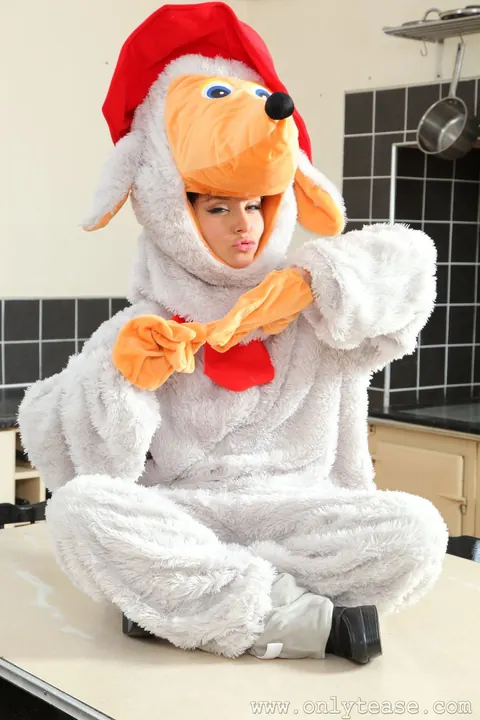 Carla Brown: Tattooed Busty MILF Strips Out of Her Dog Costume – photo 6 of 21