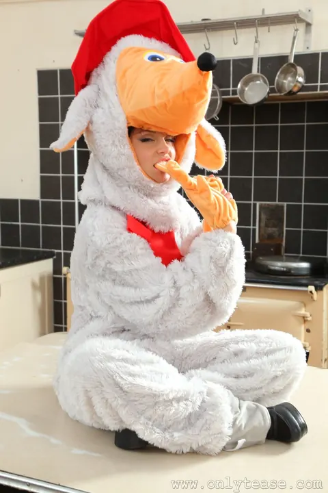 Carla Brown: Tattooed Busty MILF Strips Out of Her Dog Costume – photo 7 of 21