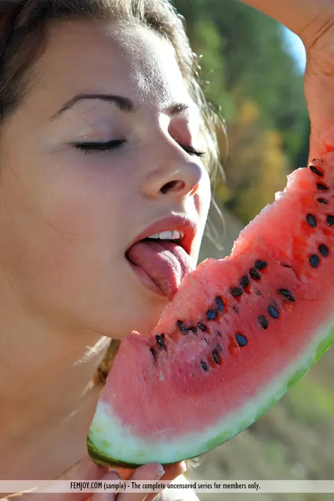 Alisa B: European Brunette Bites Watermelon and Spreads Outdoors – photo 6 of 16