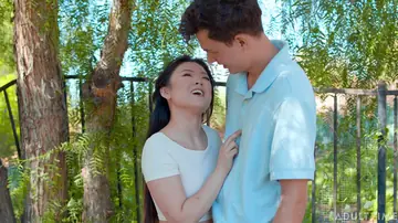 Asian Brunette Fucks a Black Man in Interracial Sex