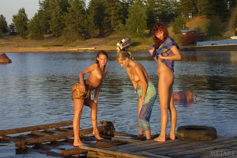 Woman Walks and Poses Nude on the Sandy Beach – photo 2 of 21