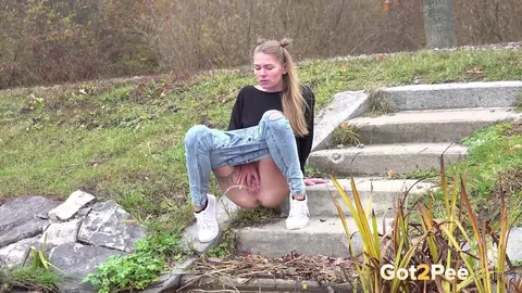 Claudia Mac: Czech Blonde with Tattoo Pisses on Concrete Steps Outdoors – photo 4 of 15