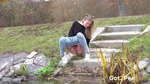 Claudia Mac: Czech Blonde with Tattoo Pisses on Concrete Steps Outdoors – photo 12 of 15