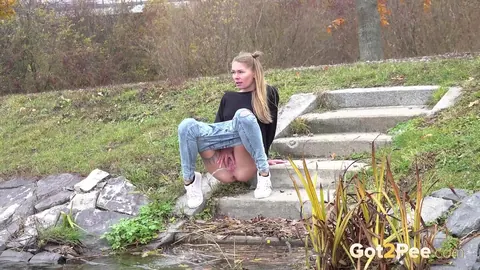 Claudia Mac: Czech Blonde with Tattoo Pisses on Concrete Steps Outdoors – photo 5 of 15