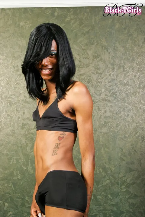 Ebony Trans Woman Undresses and Shows Off Her Cock – photo 6 of 16