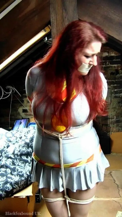 Redhead Tied to a Post in Uniform and Heels in the Attic – photo 5 of 16