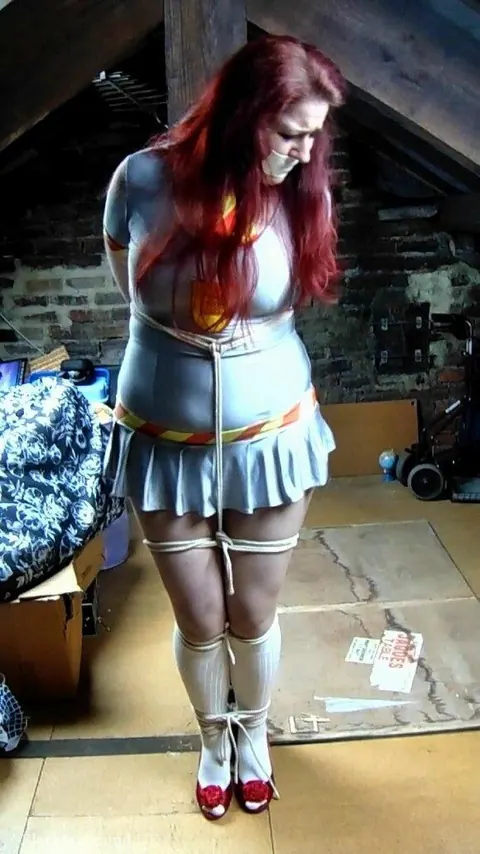 Redhead Tied to a Post in Uniform and Heels in the Attic – photo 2 of 16