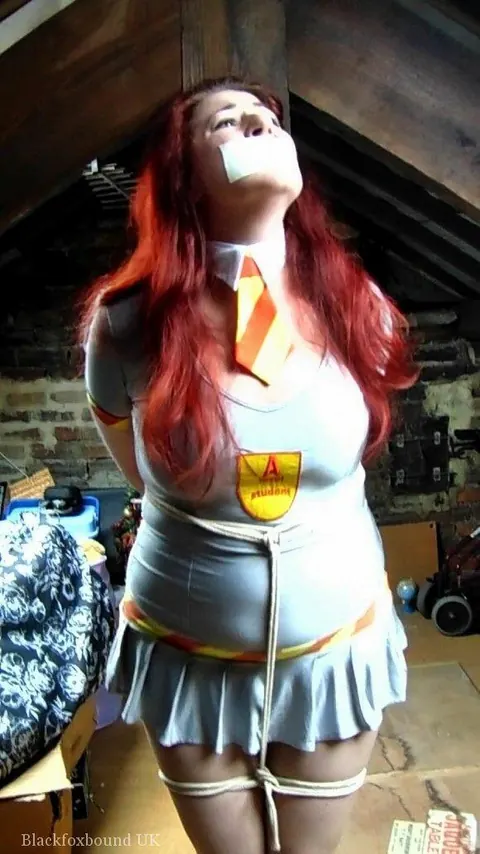 Redhead Tied to a Post in Uniform and Heels in the Attic – photo 6 of 16