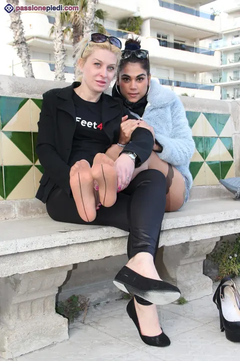 Two Women in Pantyhose Kiss and Play with Feet Outdoors – photo 11 of 12