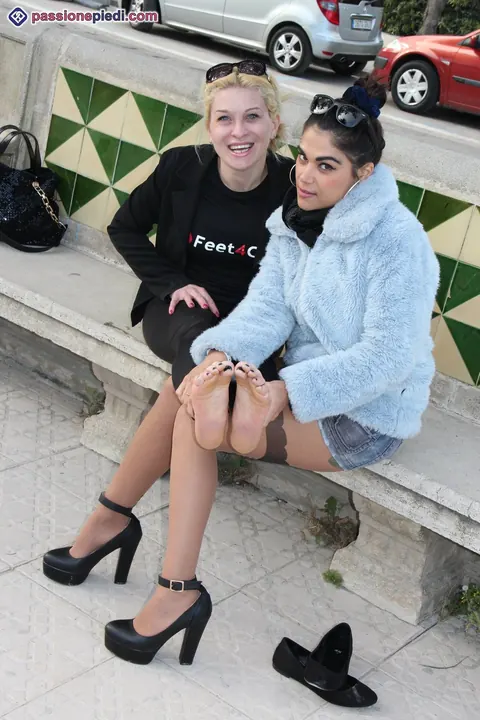 Two Women in Pantyhose Kiss and Play with Feet Outdoors – photo 7 of 12
