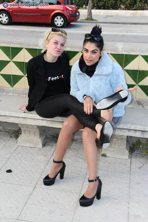 Two Women in Pantyhose Kiss and Play with Feet Outdoors – photo 3 of 12