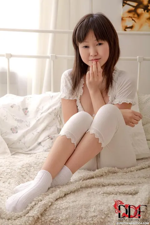 Thick Asian Woman in Socks Fingers Her Pussy – photo 2 of 16