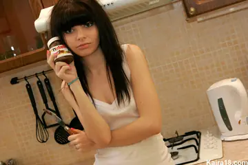 Slim Czech Brunette Reveals Her Small Natural Tits in the Kitchen