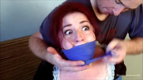 Redhead Maid Bound and Gagged in Stockings and Heels – photo 8 of 16