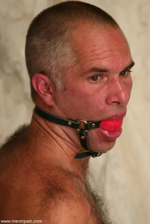Dominant Woman Kisses and Restrains Her Submissive Man – photo 2 of 15