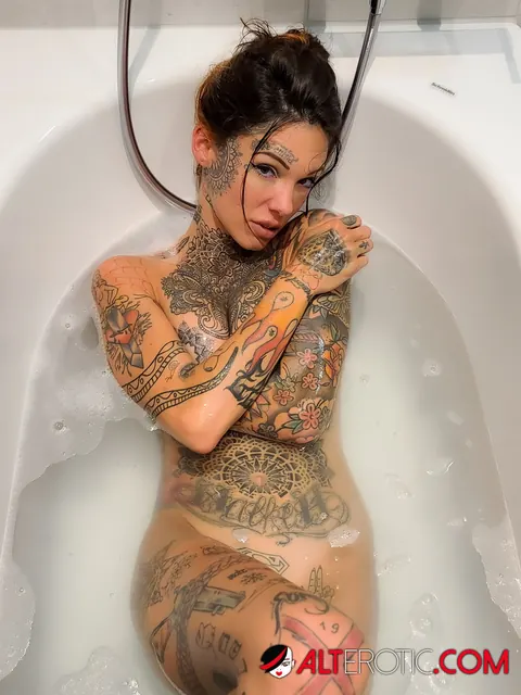 Tattooed Brunette Sucks Cock and Rides in the Bath – photo 16 of 16