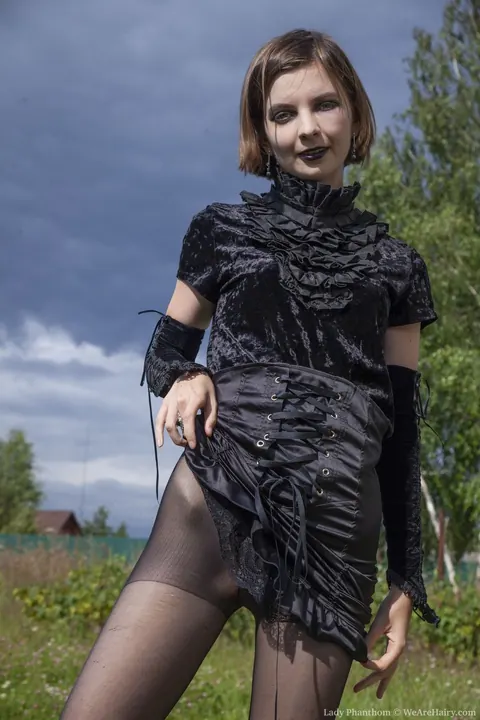 Lady Phanthom: Short-Haired Slim Brunette in Pantyhose Spreads Her Hairy Pussy Outdoors – photo 4 of 20