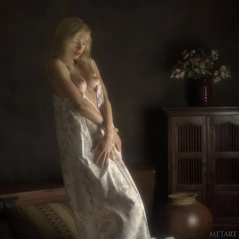Blonde Undresses and Poses for a Glamour Gallery – photo 11 of 21