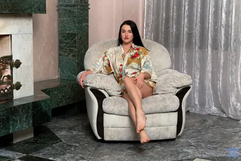 Eva Red: Brunette Strips and Poses to Display Her Natural Tits – photo 1 of 21