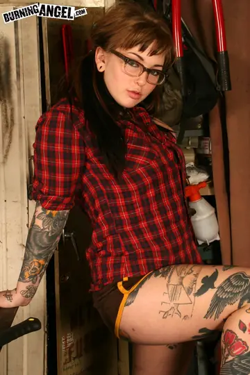 Tattooed Brunette in Glasses Toys Her Pussy and Spreads