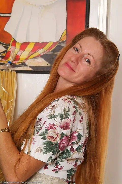 Thick Redhead MILF Strips Out of Her Skirt in the Kitchen – photo 5 of 20