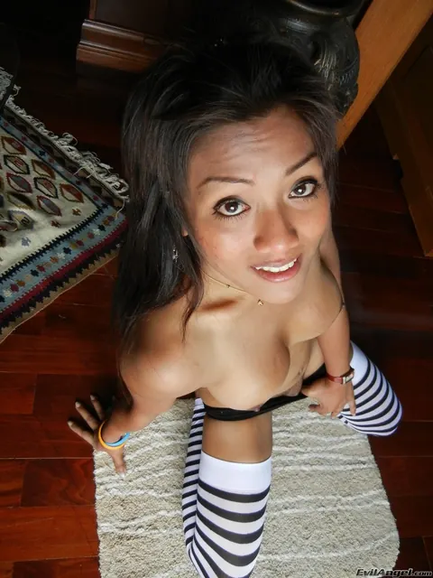 Asian Trans Woman in Stockings Strokes Her Cock – photo 7 of 17