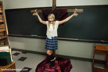 Blonde in Bondage Gives a Blowjob Then Gets Fucked