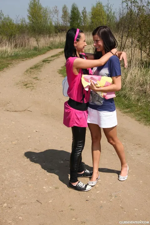 Angelica Kitten: Brunette Lesbians in Skirts Kiss and Lick Pussy Outdoors – photo 1 of 21