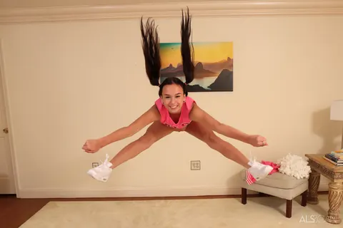 Dakota Tyler: Flexible Brunette in Pigtails Strips Out of Her Uniform and Spreads – photo 7 of 16
