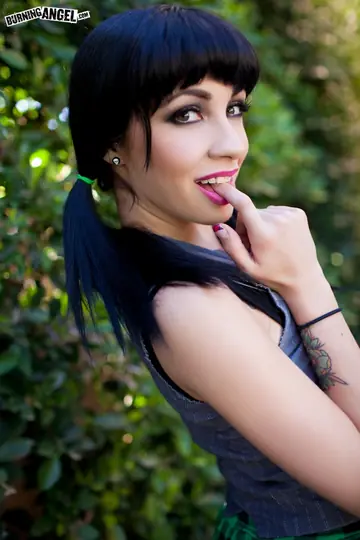 Slim Brunette in Pigtails Fingers Her Pussy Outdoors
