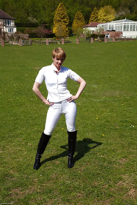 Mature Redhead in Boots Spreads Her Hairy Pussy Outdoors – photo 1 of 16