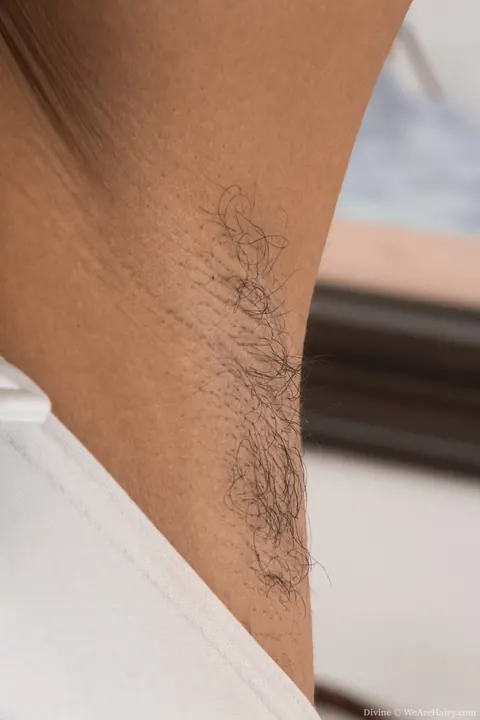 Ebony Woman Poses Nude and Shows Hairy Armpits – photo 1 of 20