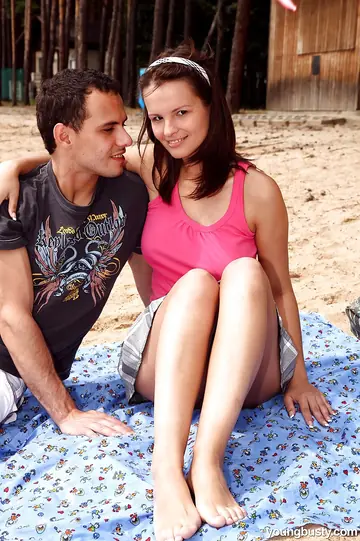 Busty Brunette Takes a Handjob and Fucks on a Picnic Table in the Woods