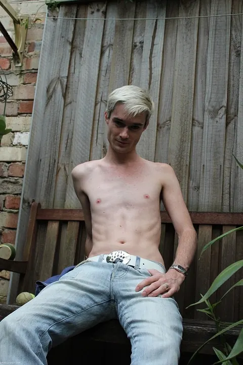 Blonde Man Strips and Strokes His Cock on the Bed – photo 6 of 21