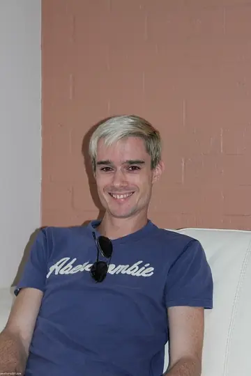Blonde Man Strips and Strokes His Cock on the Bed