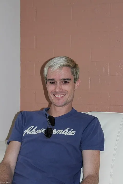 Blonde Man Strips and Strokes His Cock on the Bed – photo 1 of 21
