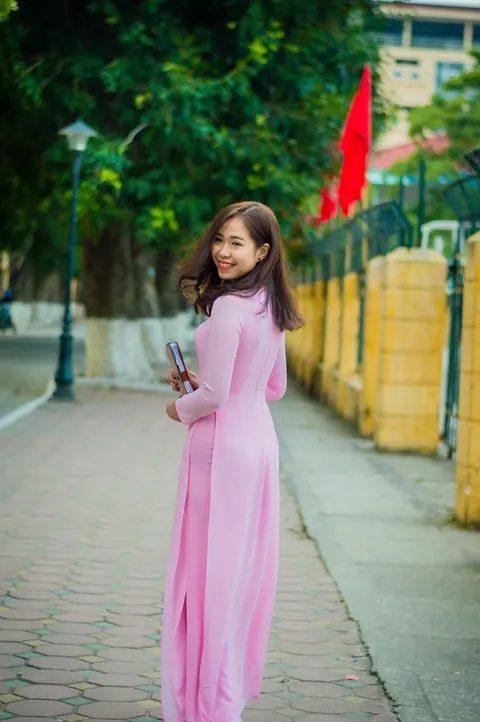 Asian Brunette Poses in a Dress Outdoors – photo 17 of 21