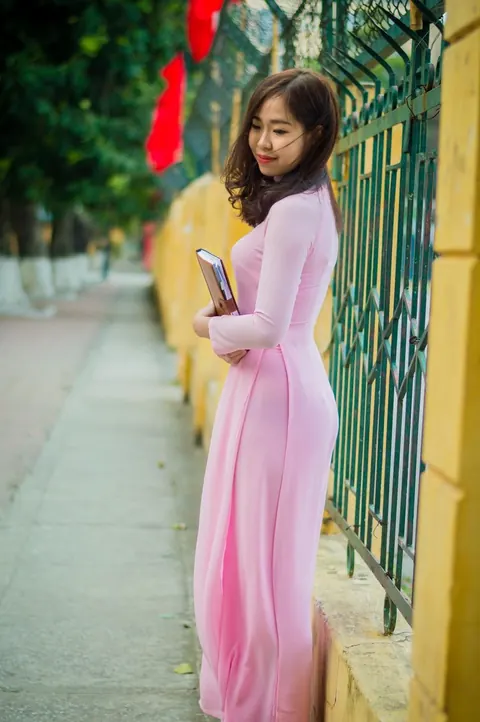 Asian Brunette Poses in a Dress Outdoors – photo 18 of 21