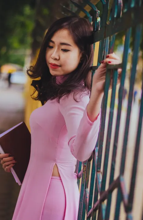 Asian Brunette Poses in a Dress Outdoors – photo 7 of 21