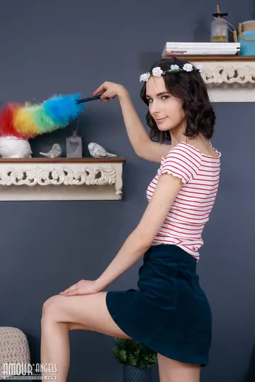 Slim Woman in a Skirt and Flower Crown Opens Her Pussy