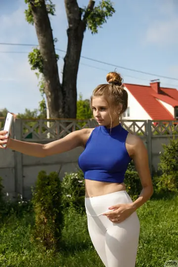 Adelina Dey – Brunette with Natural Tits Poses Nude Outdoors