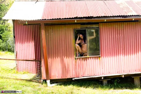 Brunette MILF Spreads Her Legs in a Bikini – photo 3 of 16