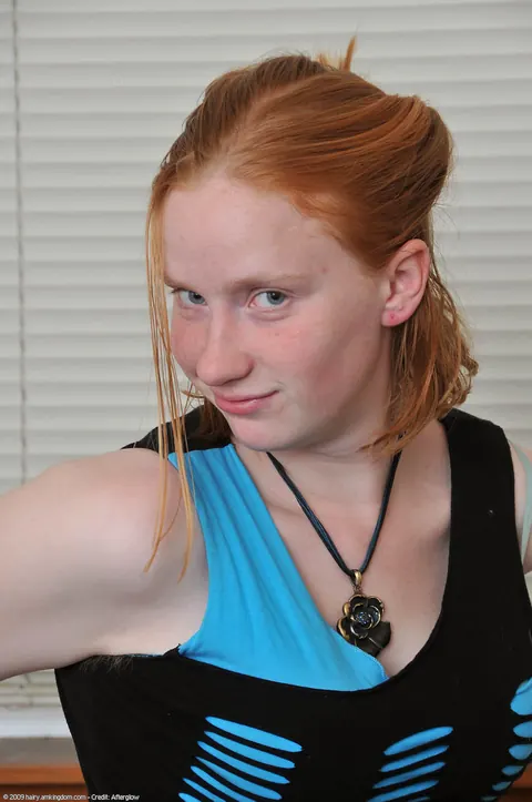 Petite Redhead with Short Hair Spreads Her Pussy in Socks – photo 3 of 20