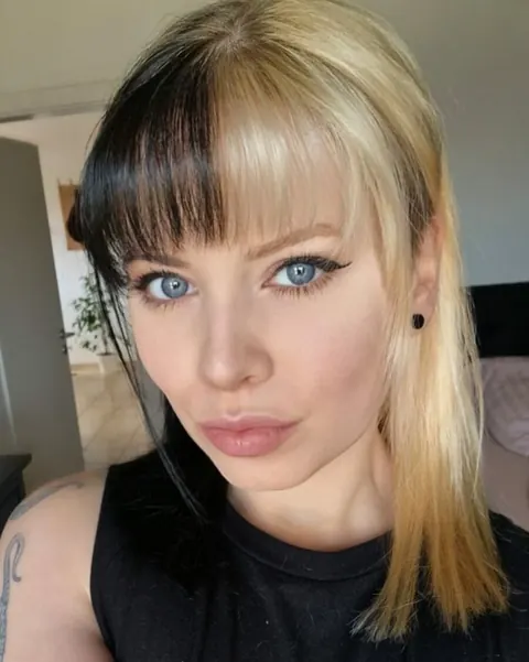 European Blonde Takes Selfies in a Dress Outdoors – photo 15 of 15